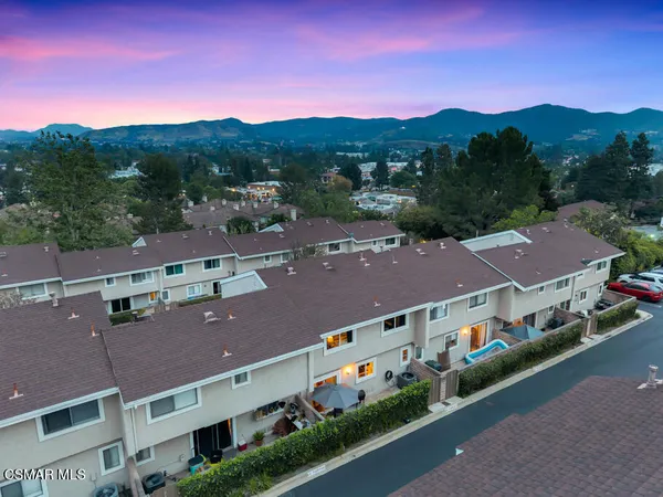 a view of city with tall buildings