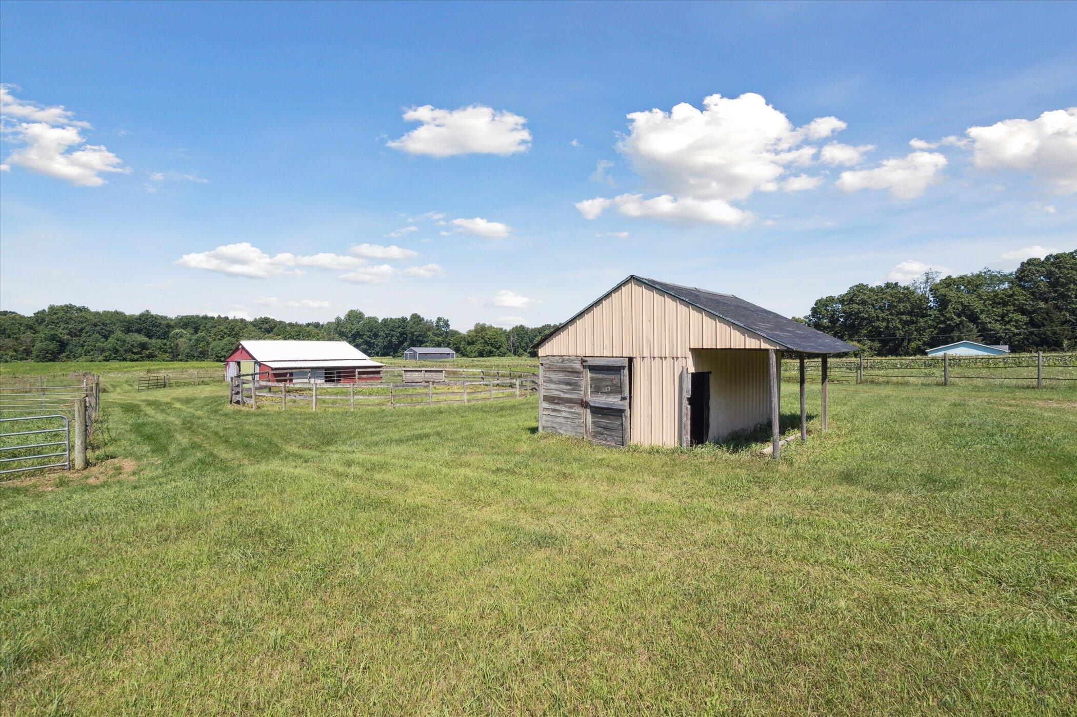 6570 Farley Road Pinckney, MI 48169 - Photo 23 of 36 22-6570-Farley-Rd-Pinckney-MI-48169-Wind