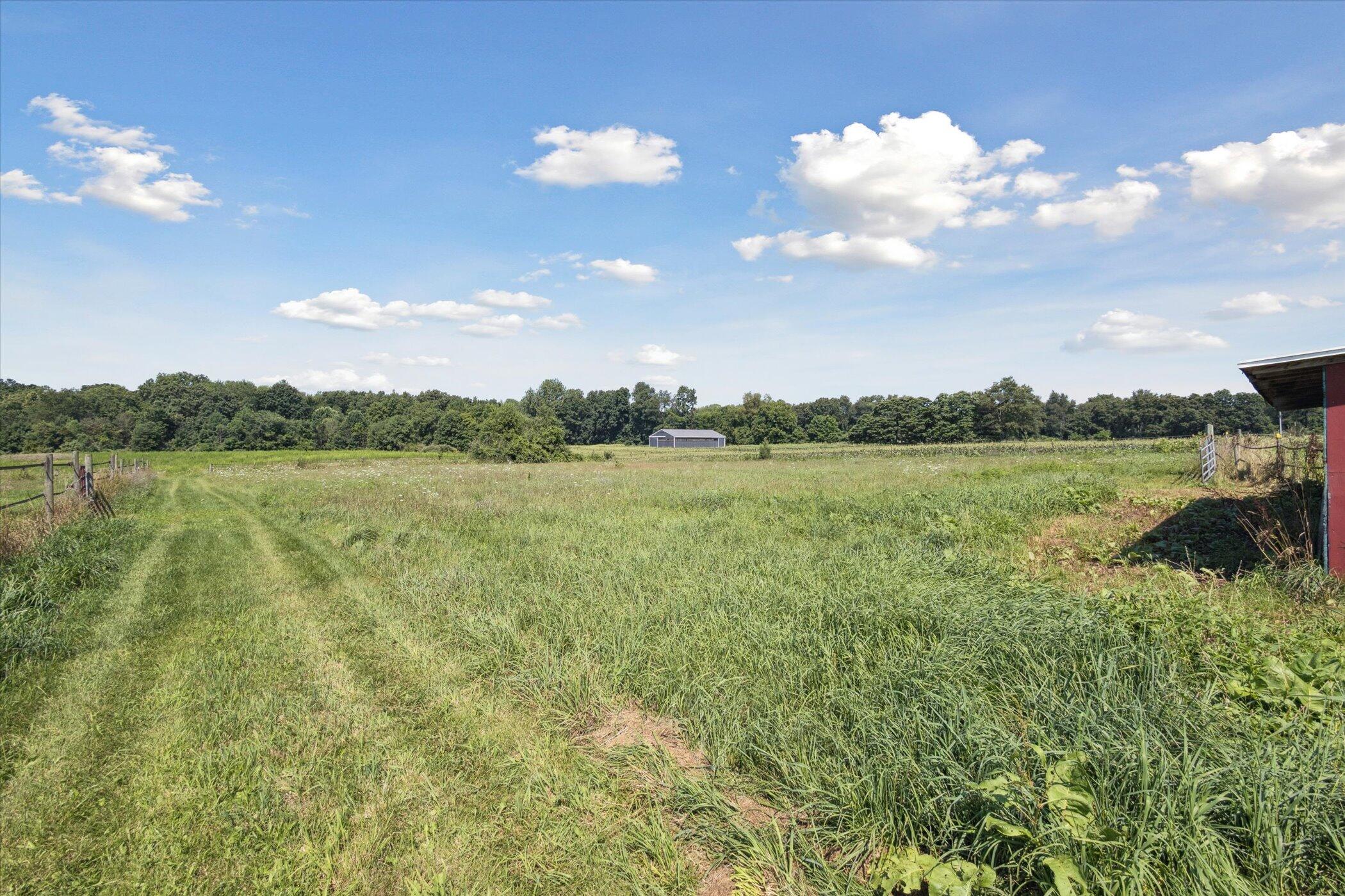 6570 Farley Road Pinckney, MI 48169 - Photo 25 of 36 24-6570-Farley-Rd-Pinckney-MI-48169-Wind