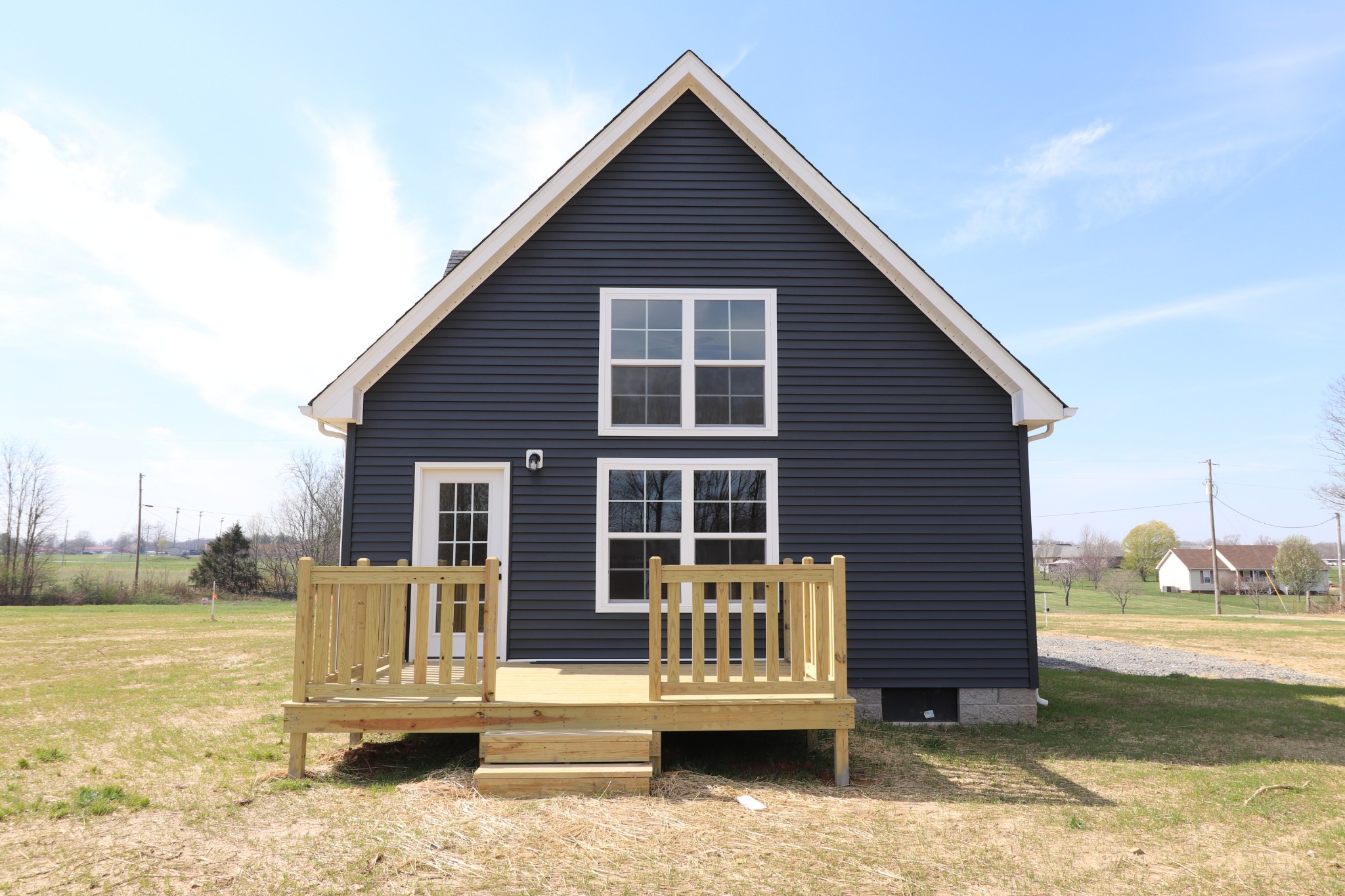 160 Garrett Road Lafayette, TN 37083 - Photo 17 of 18 a view of a house with lounge chair