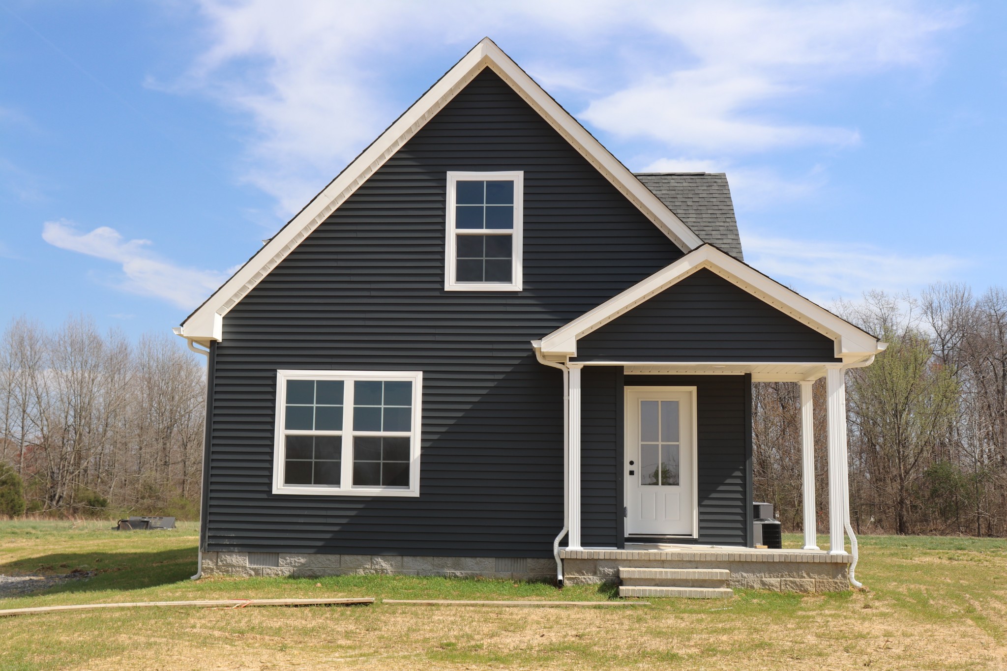 160 Garrett Road Lafayette, TN 37083 - Photo 2 of 18 a view of a house with a yard