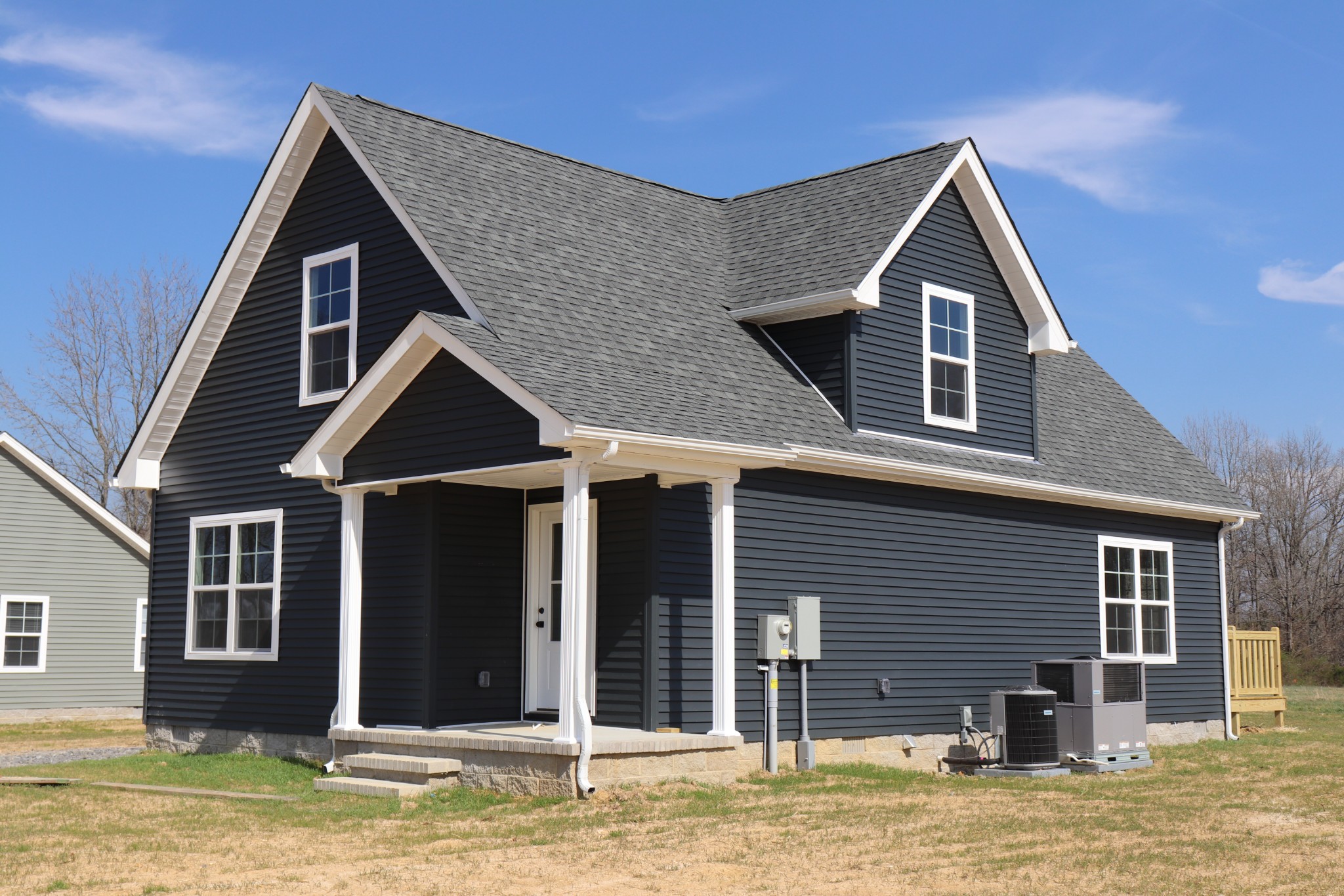 160 Garrett Road Lafayette, TN 37083 - Photo 3 of 18 a front view of a house with a yard
