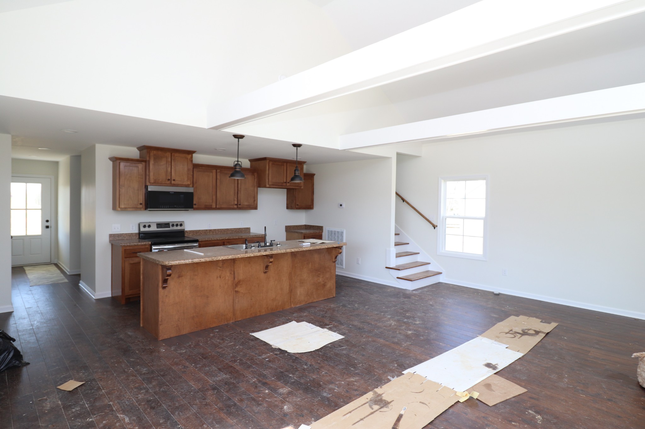 160 Garrett Road Lafayette, TN 37083 - Photo 4 of 18 a kitchen with granite countertop a stove and a sink