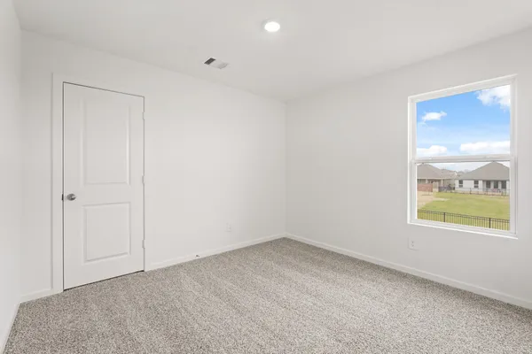 an empty room with a window