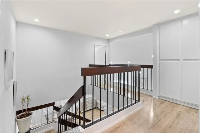 a view of a hallway with staircase