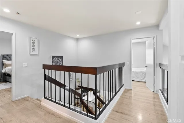 a view of a hallway with windows