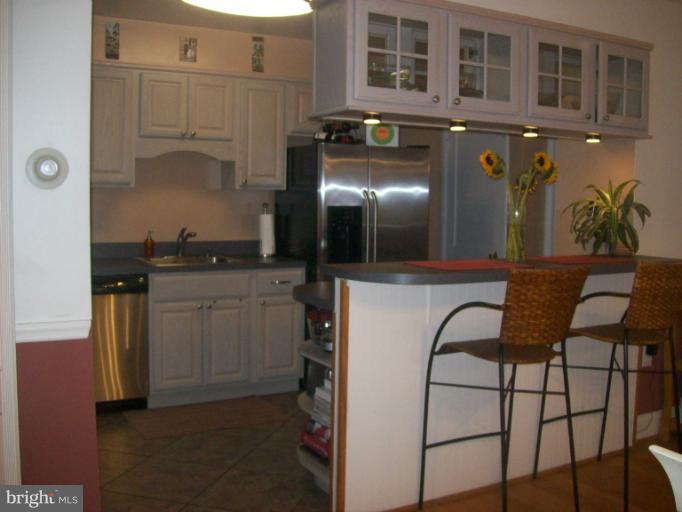 8 Murdock Road Baltimore, MD 21212 - Photo 16 of 24 a kitchen with cabinets and outdoor space