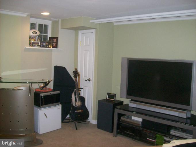 8 Murdock Road Baltimore, MD 21212 - Photo 17 of 24 a room with furniture and gym equipment