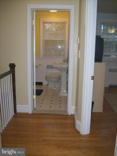 8 Murdock Road Baltimore, MD 21212 - Photo 7 of 24 a view of a bathroom with a glass door