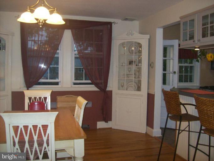 8 Murdock Road Baltimore, MD 21212 - Photo 9 of 24 a view of a dining room with furniture and wooden floor