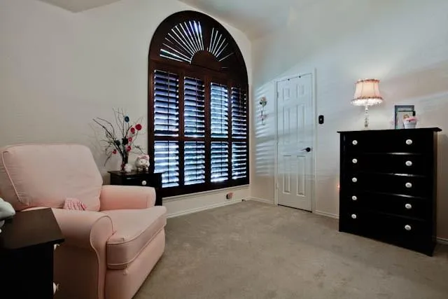 a view of livingroom with furniture and a window