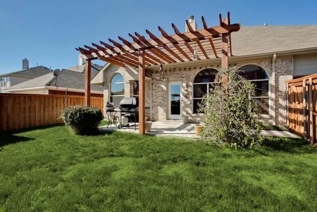 front view of a house with a big yard