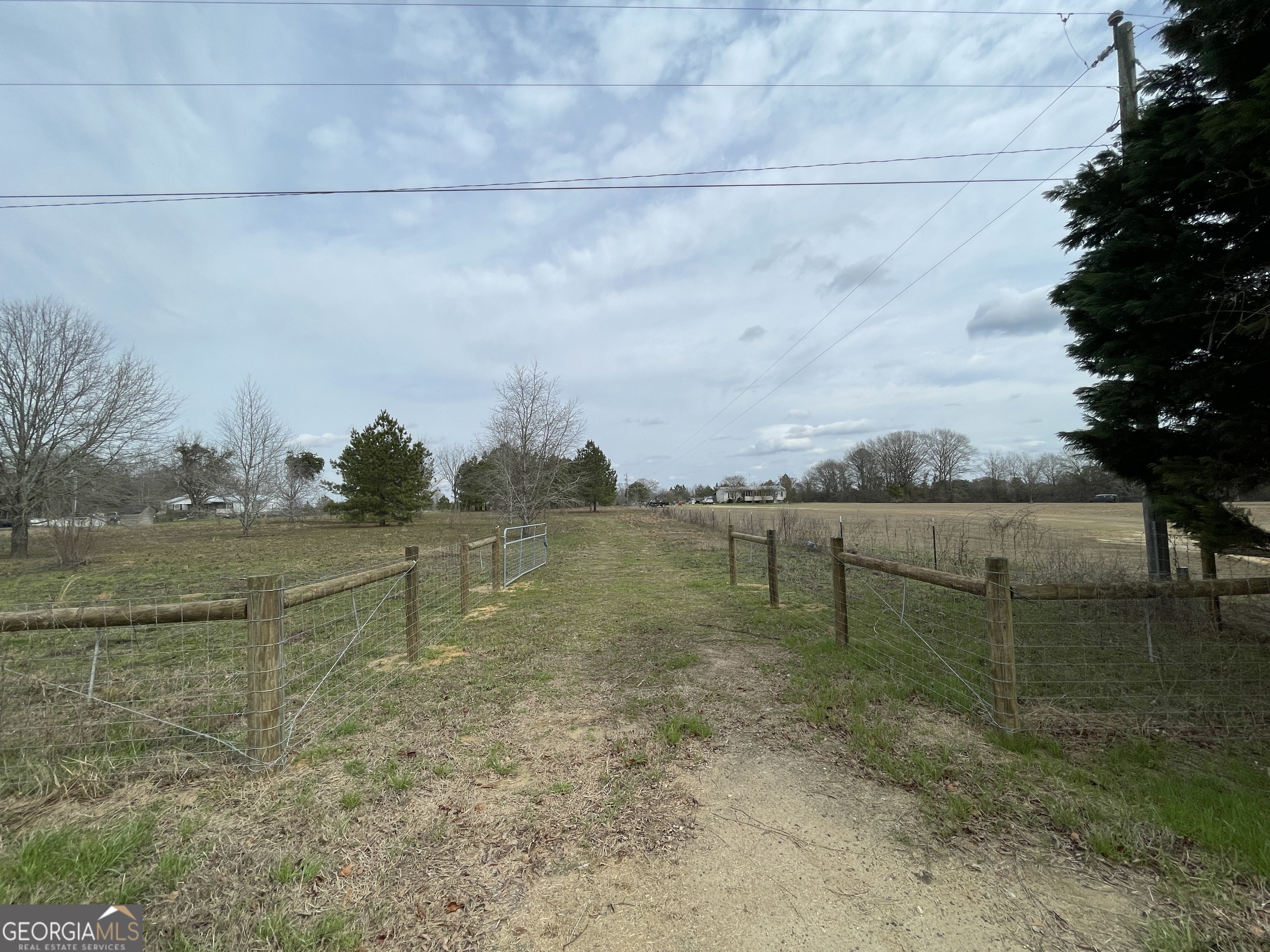 141 James English Road Cochran, GA 31014 - Photo 1 of 7 a view of lake with green space