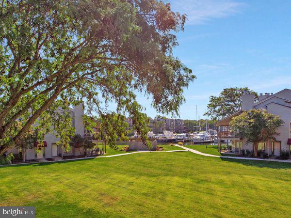 7002 Channel Village Court, Unit 101 Annapolis, MD 21403 - Photo 13 of 48 a view of a swimming pool and outdoor space