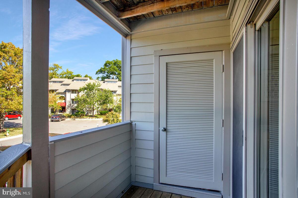 7002 Channel Village Court, Unit 101 Annapolis, MD 21403 - Photo 22 of 48 a view of a door and a window