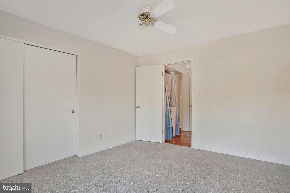 7002 Channel Village Court, Unit 101 Annapolis, MD 21403 - Photo 28 of 48 a view of an empty room
