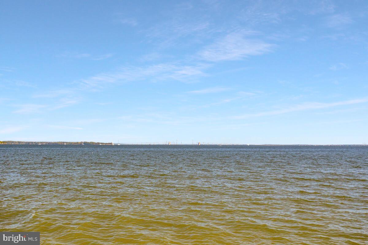 7002 Channel Village Court, Unit 101 Annapolis, MD 21403 - Photo 45 of 48 a view of beach and ocean