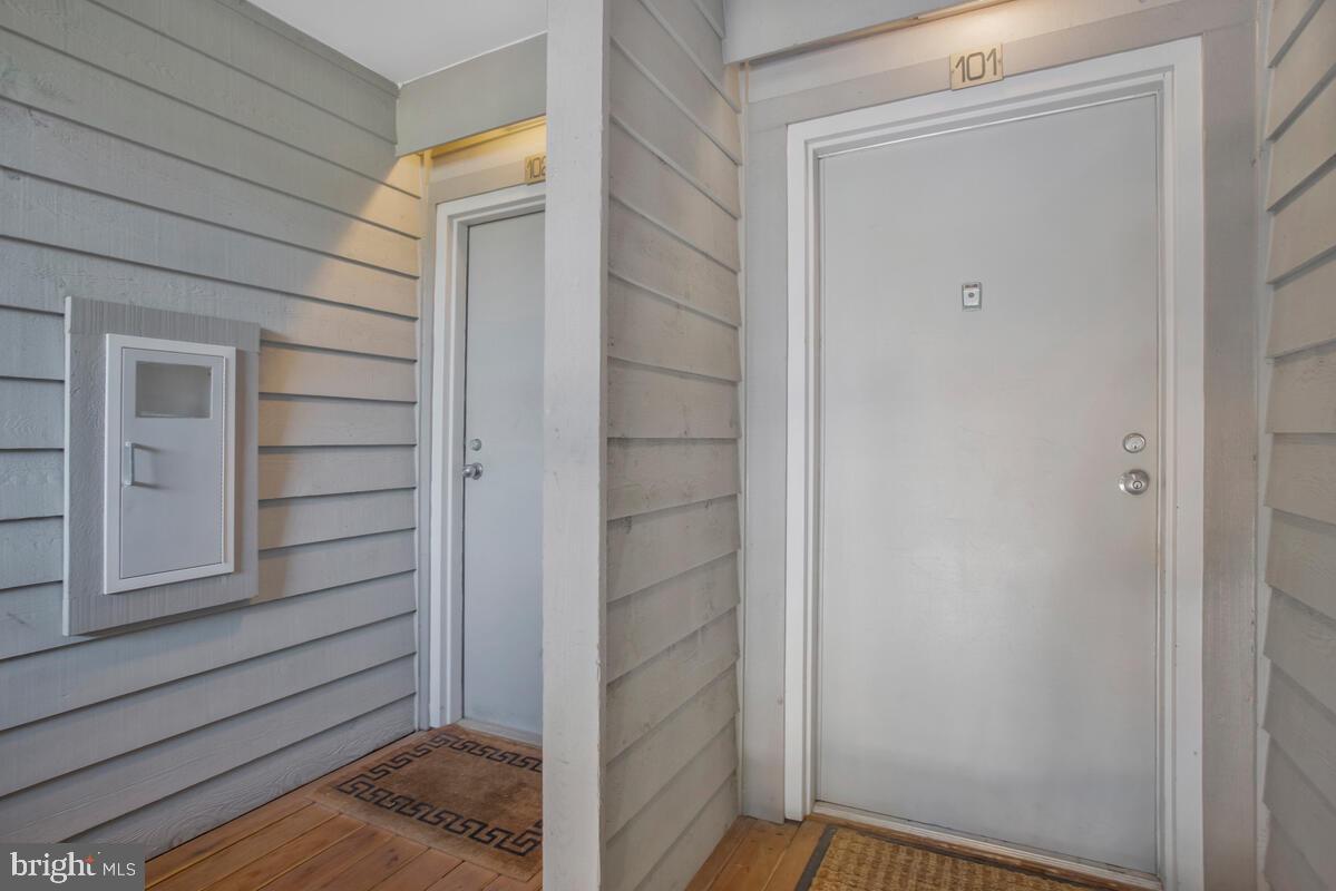 7002 Channel Village Court, Unit 101 Annapolis, MD 21403 - Photo 5 of 48 a view of front door