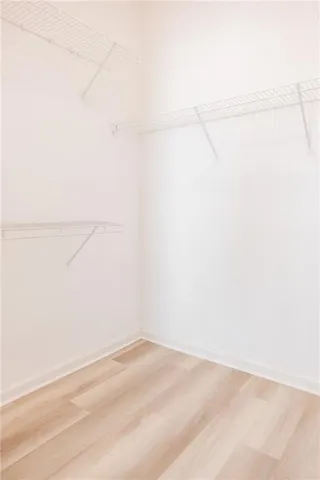 a view of a small space with racks on the wall