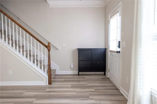 a view of a hallway view with staircase