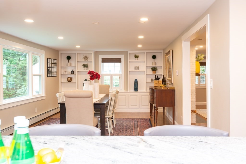 12 Moran Road Lynnfield, MA 01940 - Photo 12 of 42 a view of a dining room with furniture window and outside view