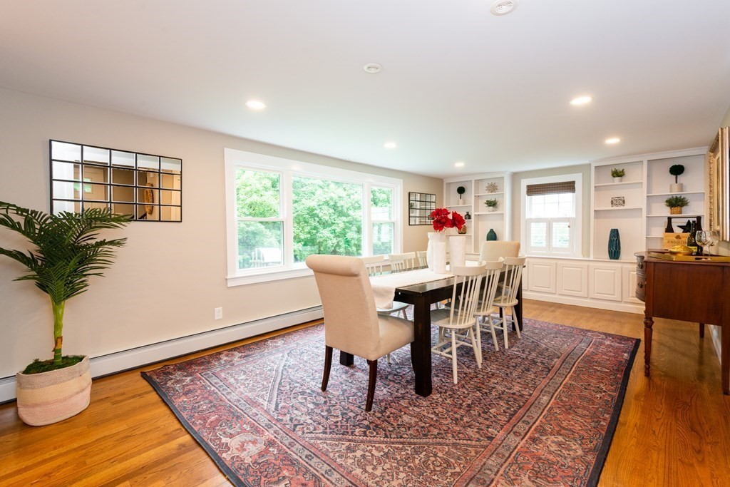 12 Moran Road Lynnfield, MA 01940 - Photo 13 of 42 a dining room with wooden floor and large window