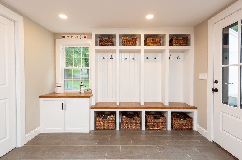 12 Moran Road Lynnfield, MA 01940 - Photo 15 of 42 a living room with furniture a window and a table