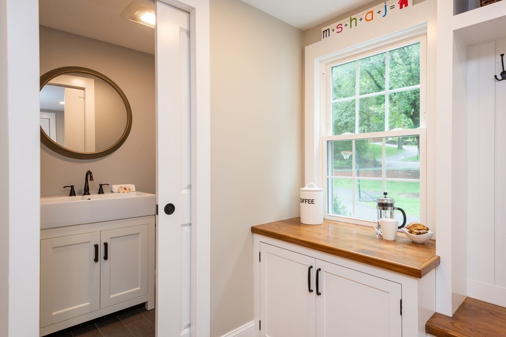 12 Moran Road Lynnfield, MA 01940 - Photo 17 of 42 a bathroom with a sink and a mirror