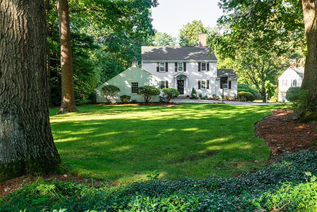 12 Moran Road Lynnfield, MA 01940 - Photo 2 of 42 a front view of a house with a yard