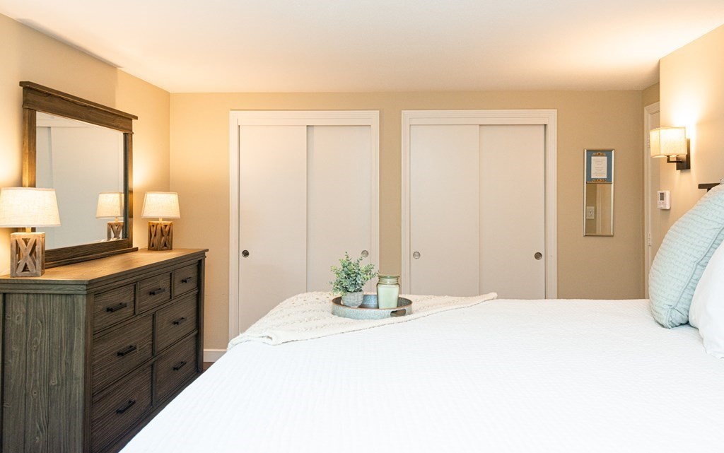 12 Moran Road Lynnfield, MA 01940 - Photo 28 of 42 a spacious bathroom with a double vanity sink and a mirror