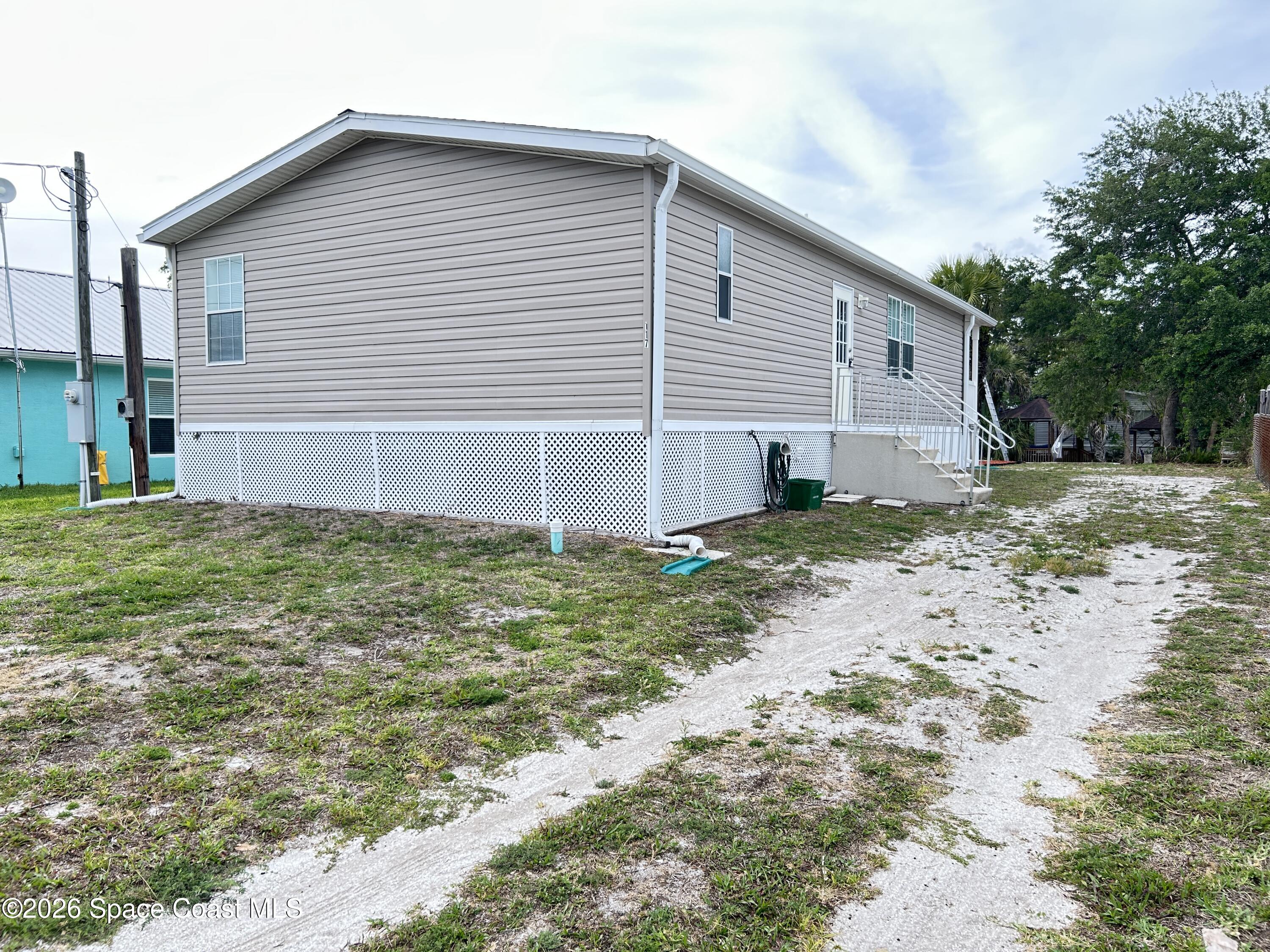 117 Lewis Street Edgewater, FL 32141 - Photo 26 of 26 FrontDriveway