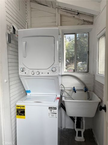 a bathroom with a sink and a window