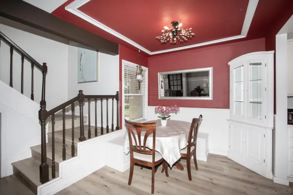 a kitchen with stainless steel appliances a stove a microwave a sink and cabinets