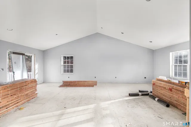 an empty room with windows