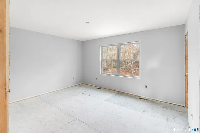 an empty room with windows