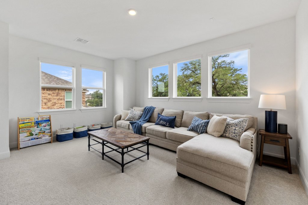 365 Pear Tree Lane Austin, TX 78737 - Photo 29 of 39 a living room with furniture and a window