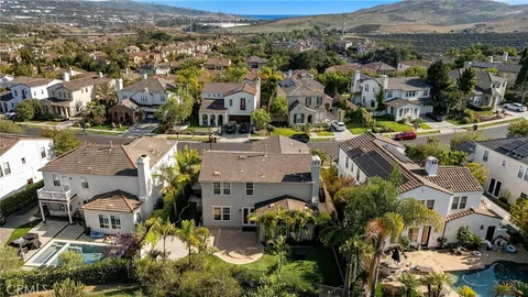 an aerial view of residential building and trees