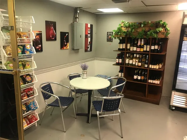 a view of outdoor space with palm trees