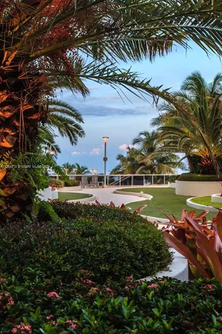 a view of swimming pool from a balcony