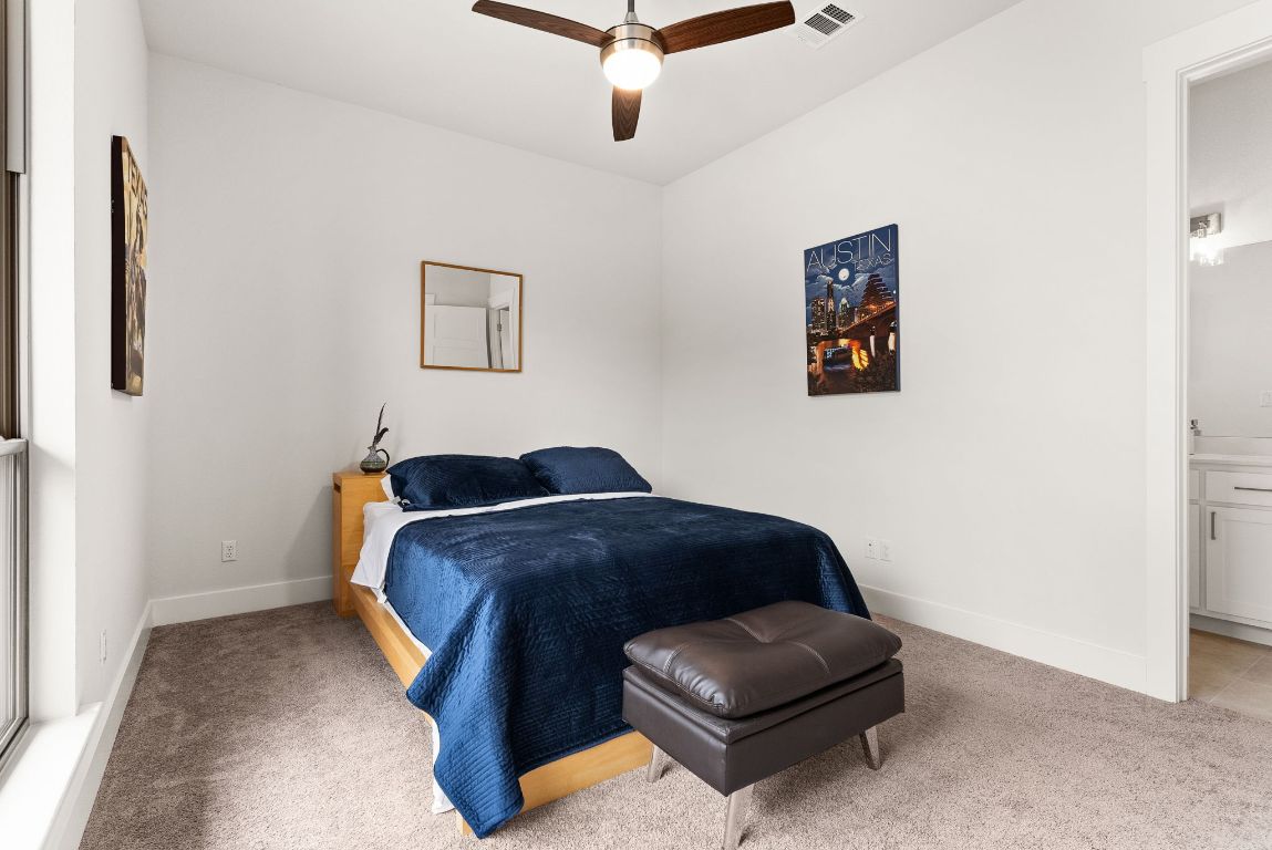 2140 Carpenter Loop Burnet, TX 78611 - Photo 19 of 40 a bed room with a bed and a couch