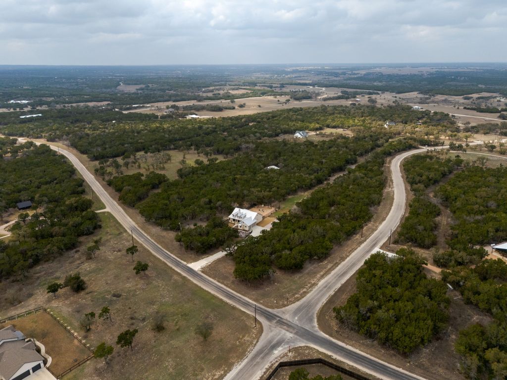 2140 Carpenter Loop Burnet, TX 78611 - Photo 2 of 40 an aerial view of lake and residential houses with outdoor space