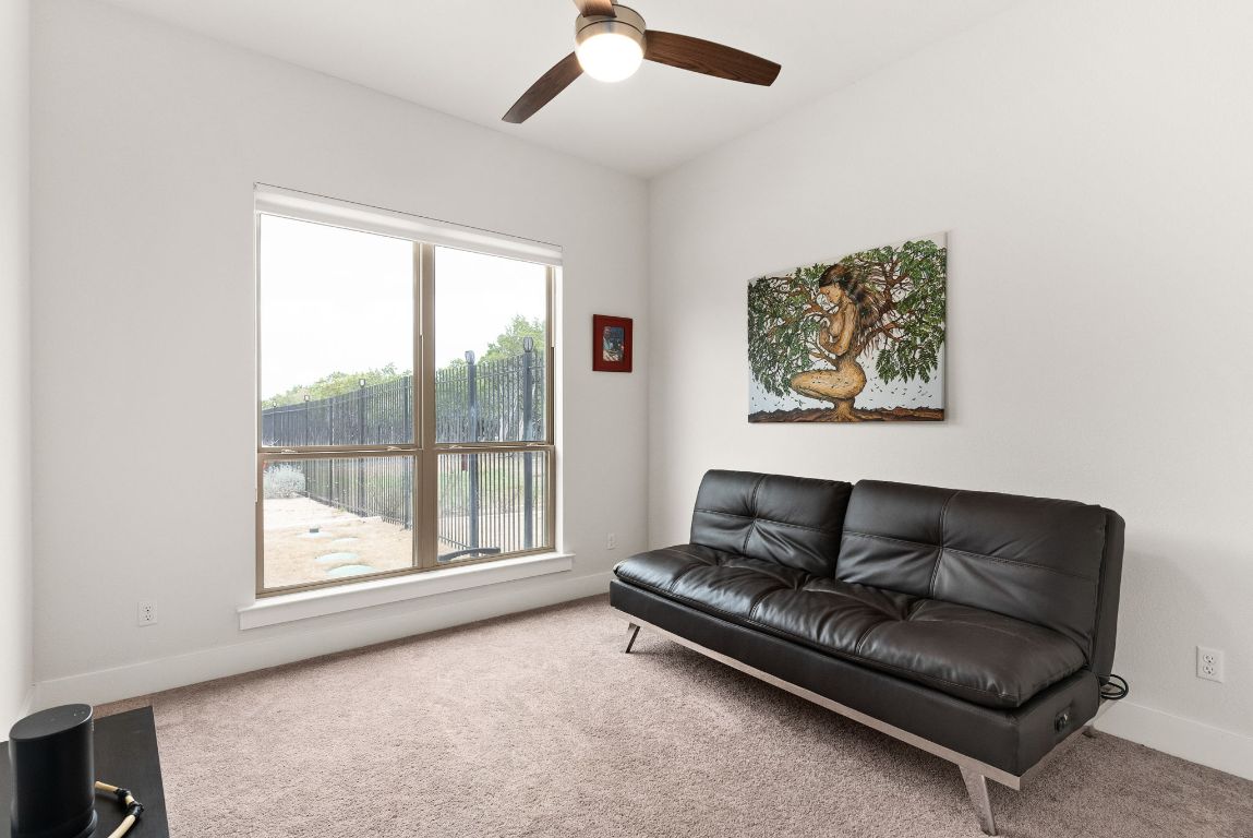 2140 Carpenter Loop Burnet, TX 78611 - Photo 22 of 40 a living room with furniture and a large window