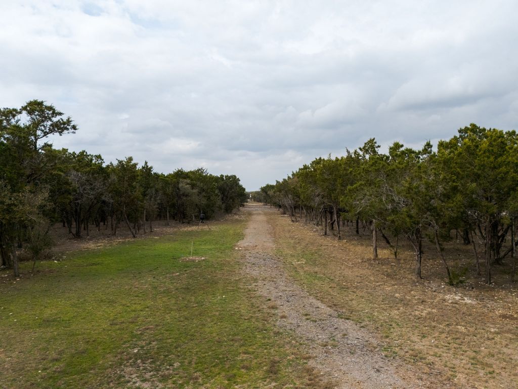 2140 Carpenter Loop Burnet, TX 78611 - Photo 32 of 40 a view of a lake with houses in back