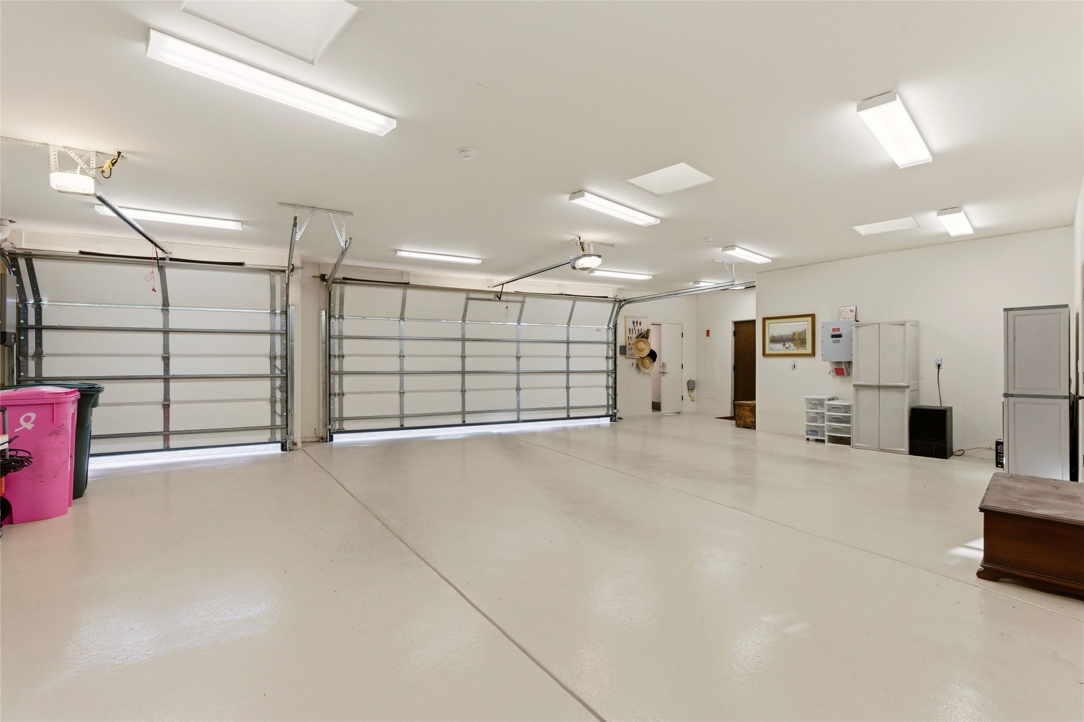 42 San Juan Ranch Road Santa Fe, NM 87506 - Photo 42 of 49 3-Car Garage with epoxy floor.