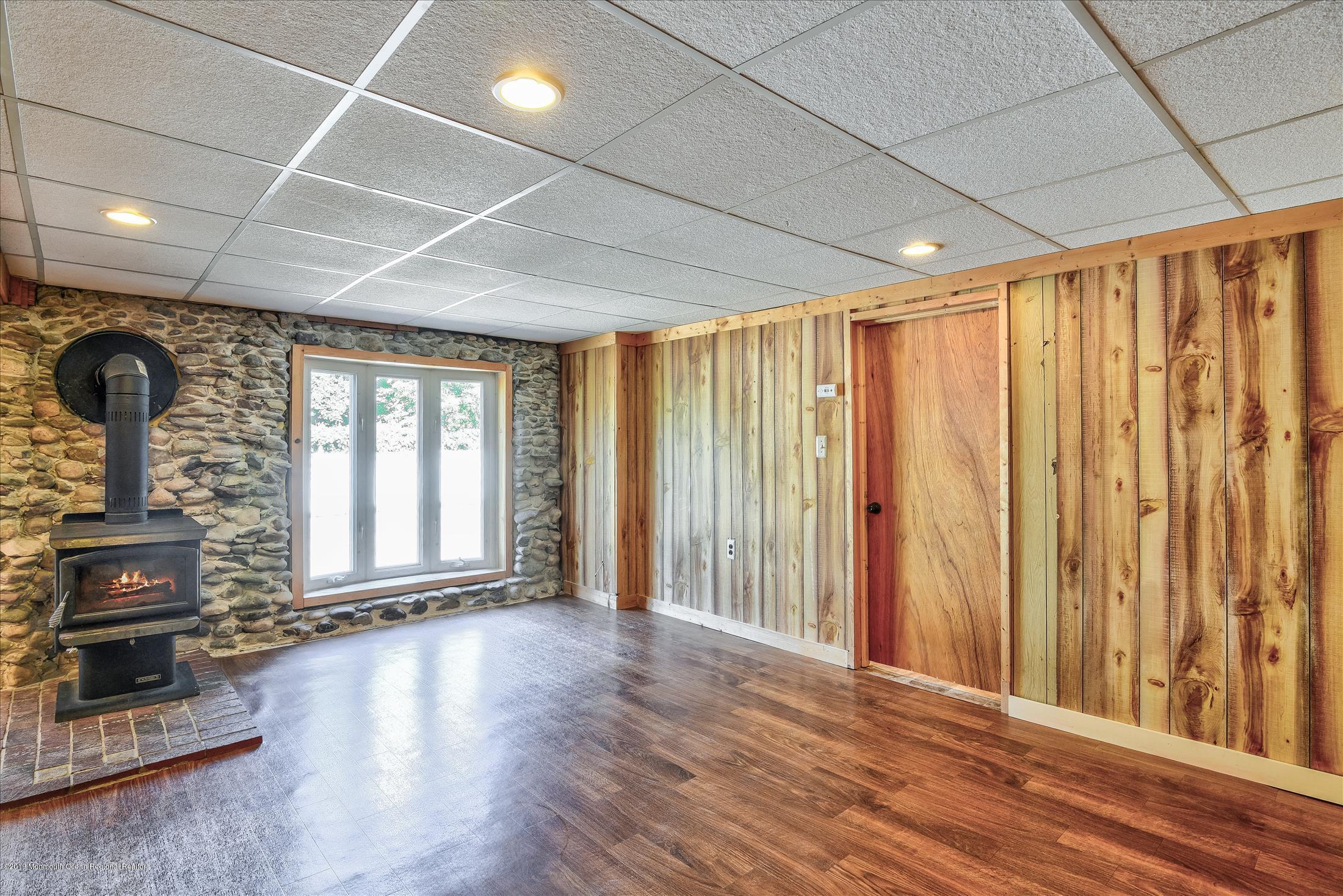 351 Pond Road Freehold, NJ 07728 - Photo 20 of 32 Woodburning stove