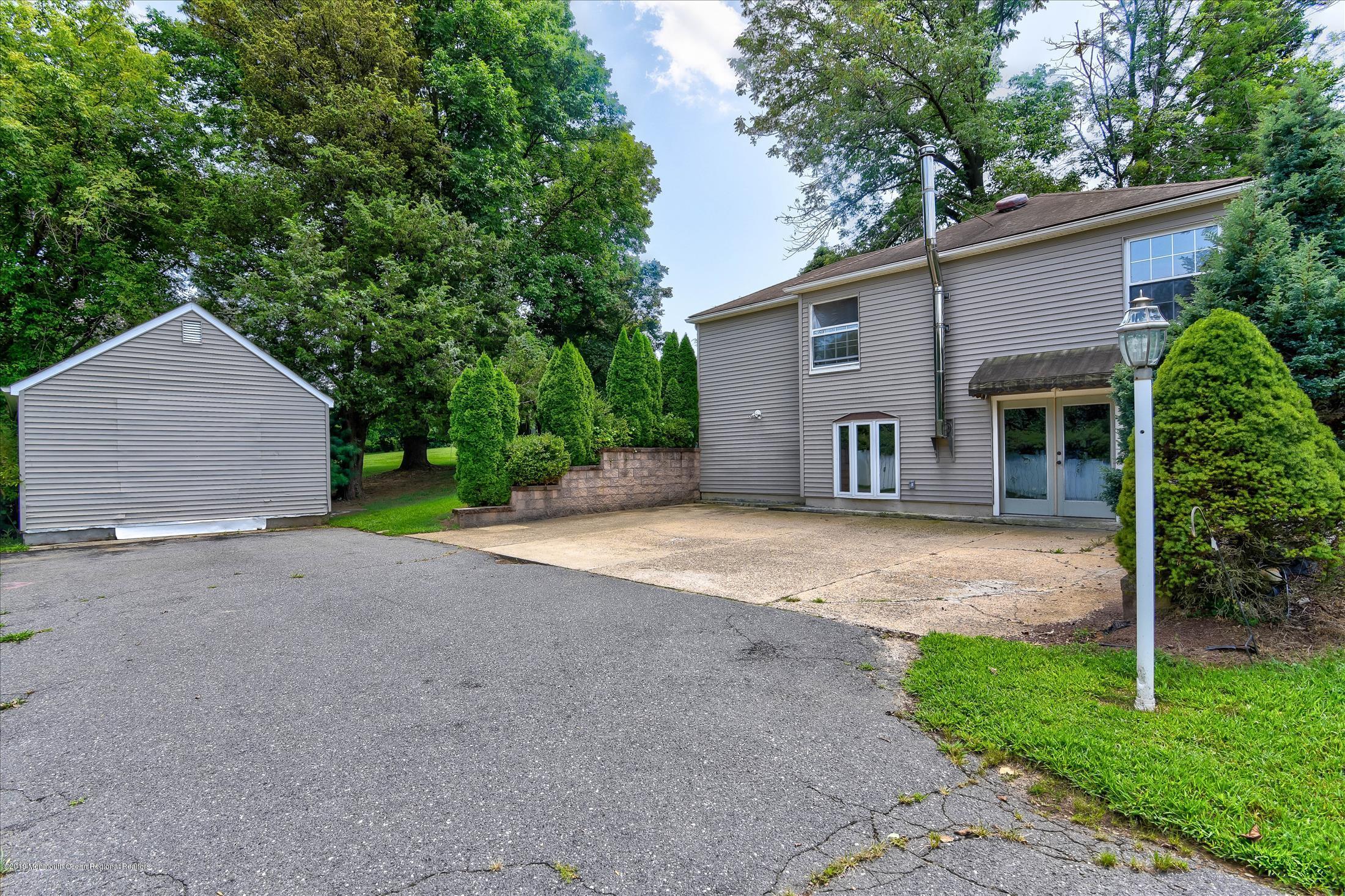351 Pond Road Freehold, NJ 07728 - Photo 24 of 32 Side View