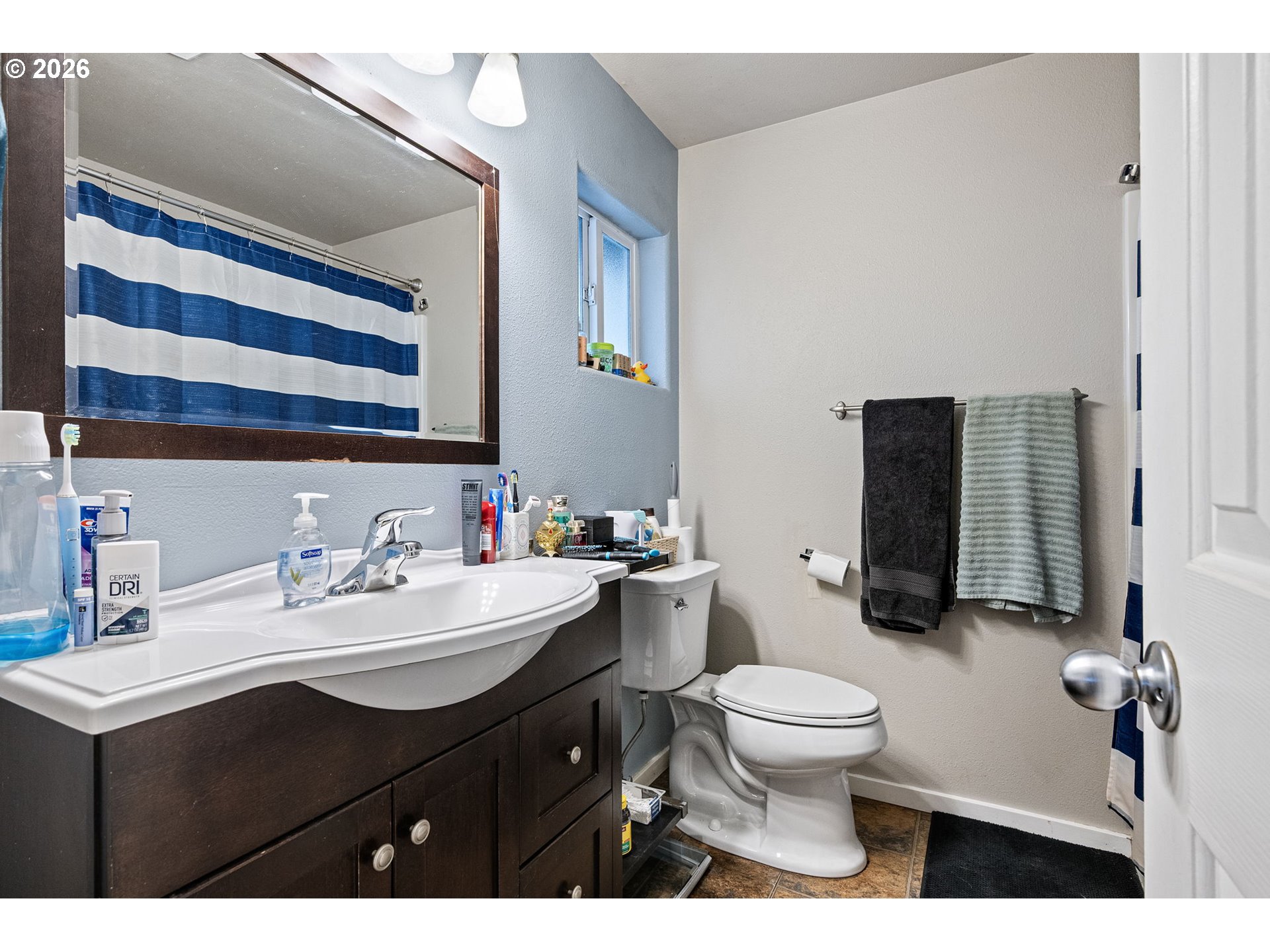 1055 Ash Grove Loop Creswell, OR 97426 - Photo 18 of 33 a bathroom with a sink toilet and shower