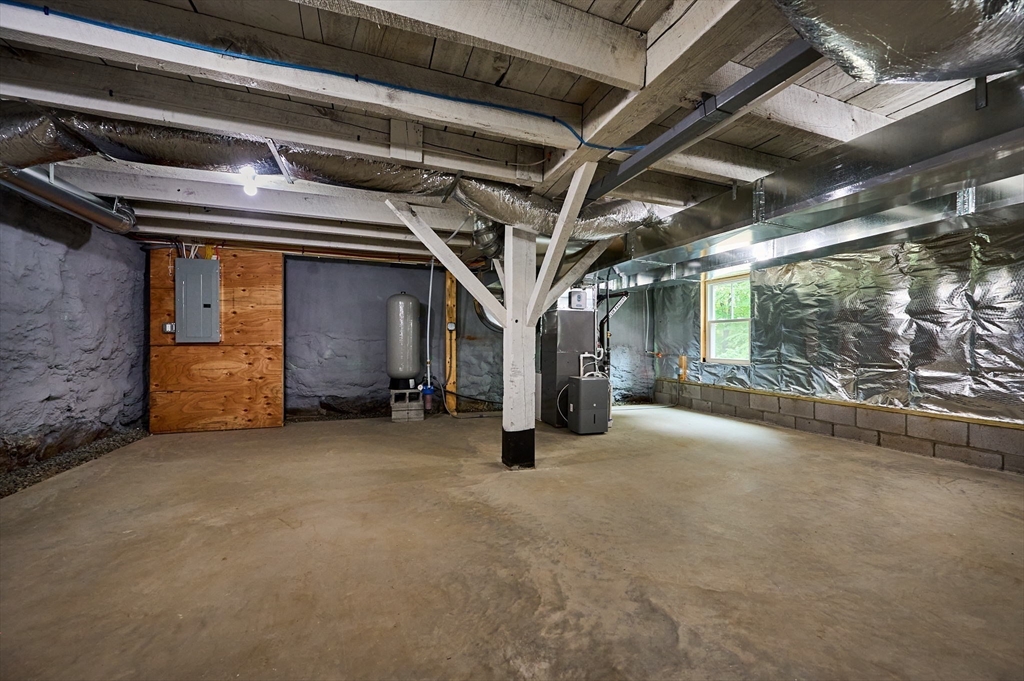 74 Lead Mine Road Southampton, MA 01073 - Photo 21 of 34 a view of an empty room with wooden floor