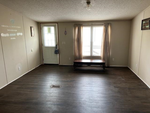 38 Bud Jennings Road Henning, TN 38041 - Photo 3 of 14 an empty room with wooden floor and windows