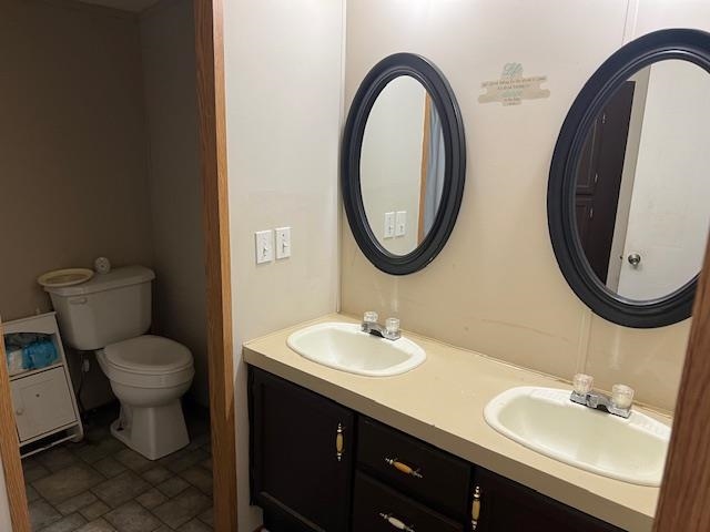 38 Bud Jennings Road Henning, TN 38041 - Photo 9 of 14 a bathroom with a toilet sink and mirror